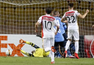 Monaco's Stephan El Shaarawy reacts as he scores against Tottenham's goalkeeper Hugo Lloris during their Europa League Group J soccer match at Louis II stadium in Monaco